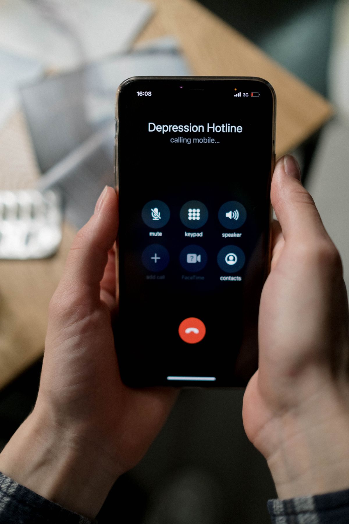 A person about to block a number on your phone from the call log