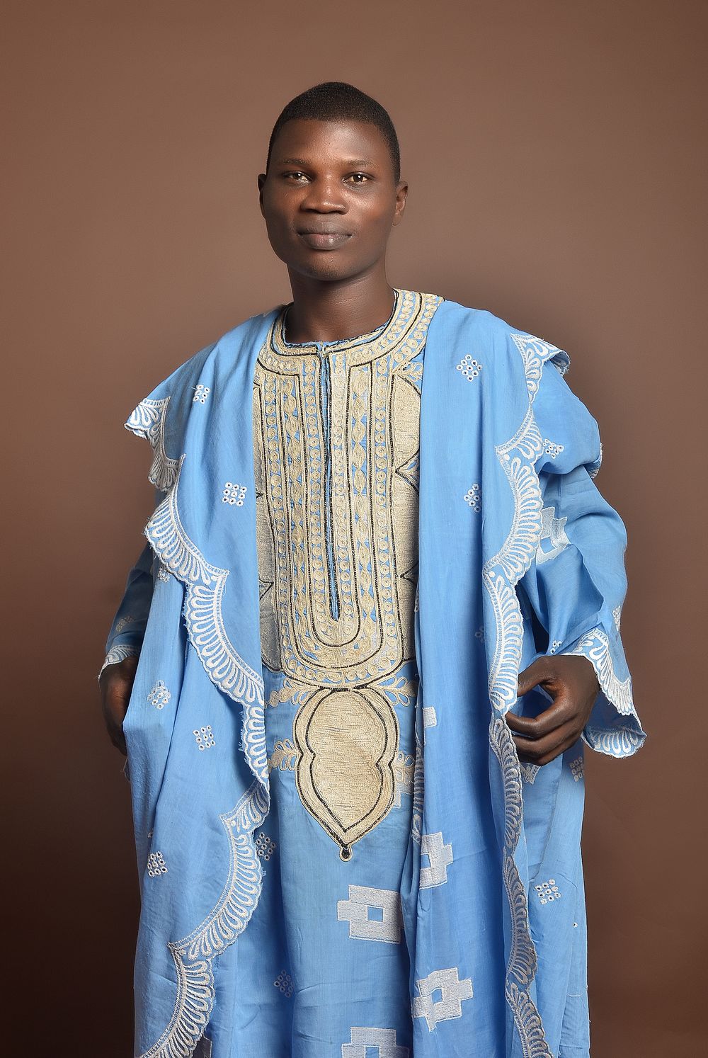 Man in an elegant blue Yoruba agbada