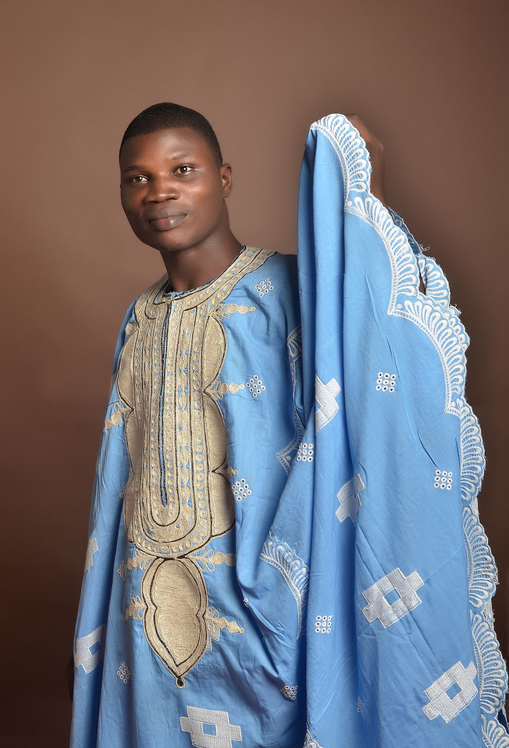 Man in traditional Nigerian agbada attire