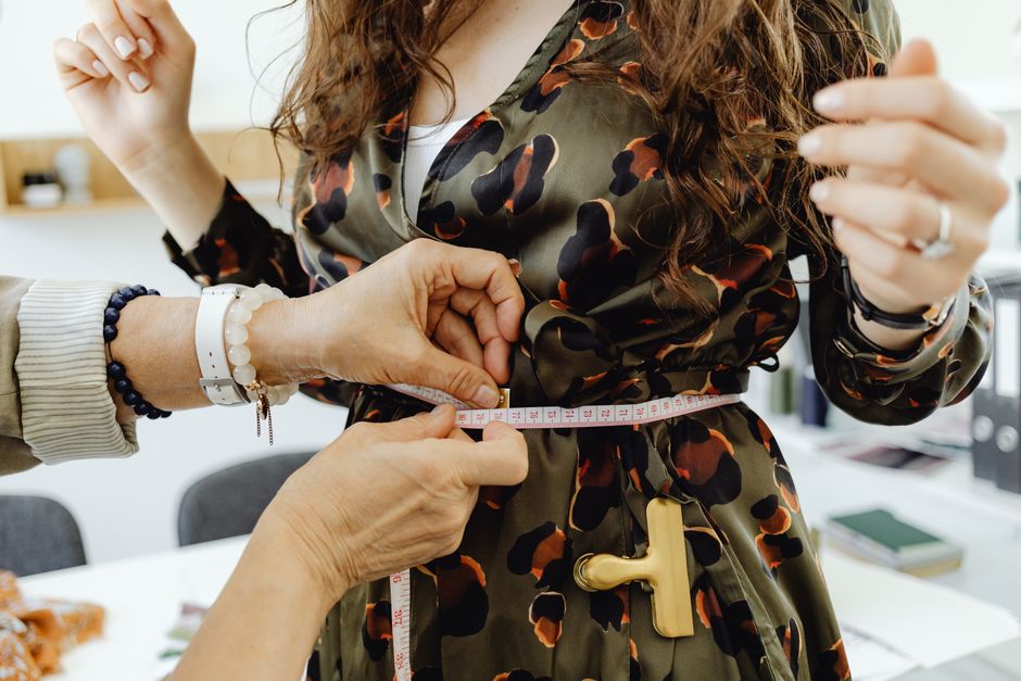 Tailor measuring a wedding gown in Altamonte Springs Tailor measuring a wedding gown in Altamonte Springs
