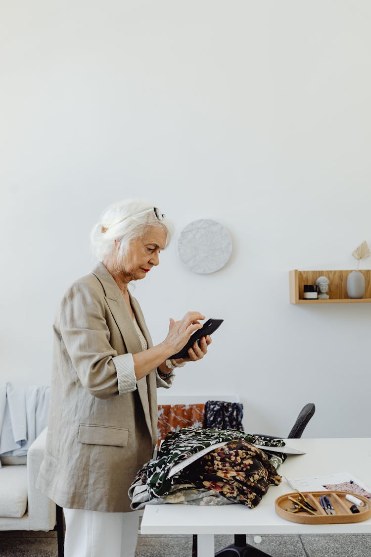 Elderly Woman In An Office 