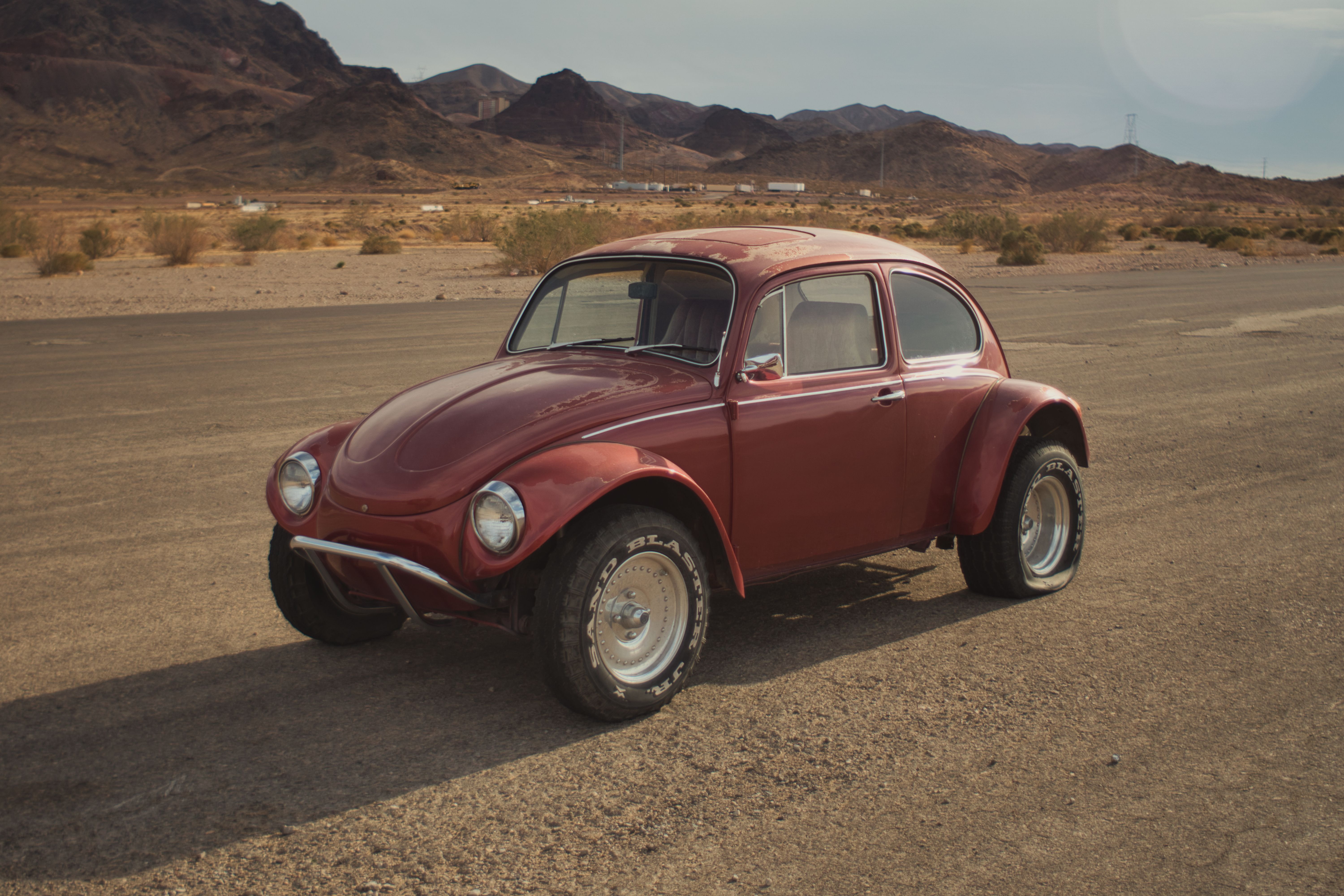 A Red Vintage Car Parked on the Road · Free Stock Photo