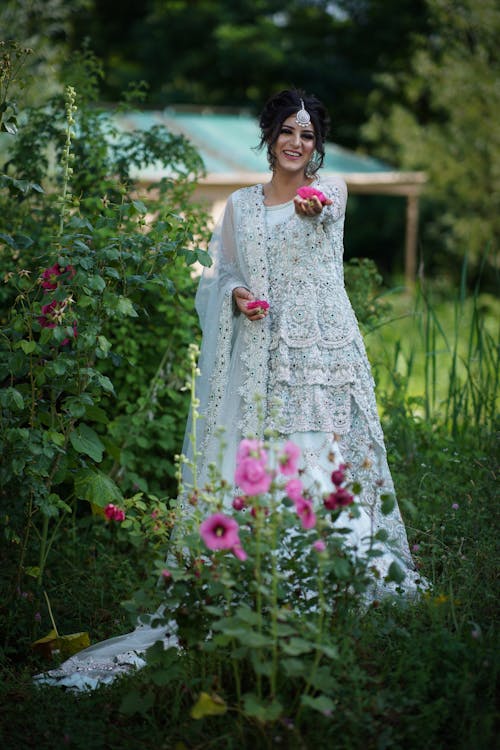 A Woman in an Elegant White Bridal Gown
