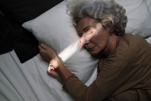 Free An Elderly Woman Sleeping Stock Photo