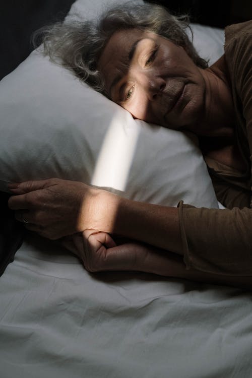 Free An Elderly Woman Sleeping Stock Photo