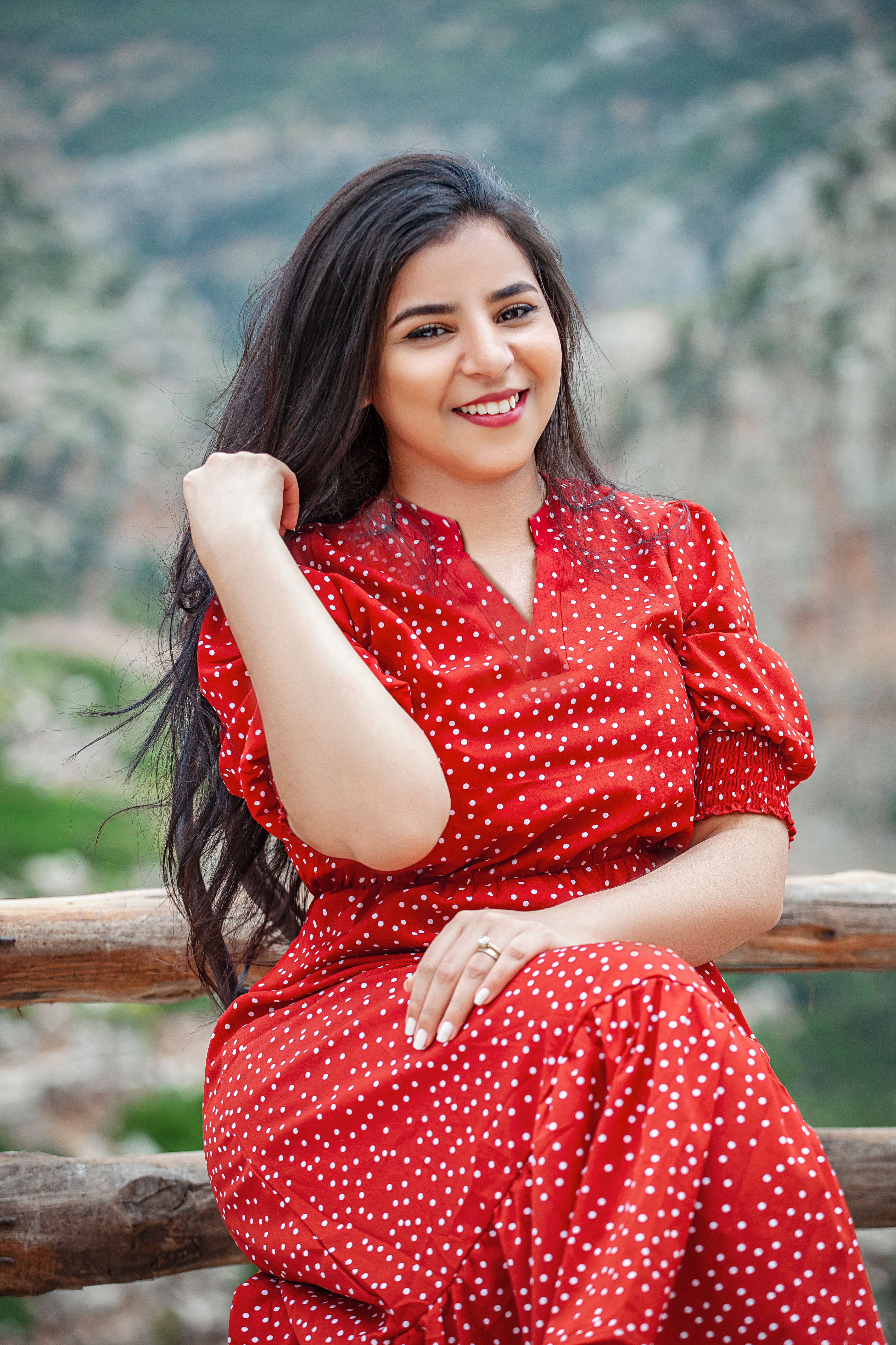 Beautiful Woman in Red Polka Dot Dress · Free Stock Photo