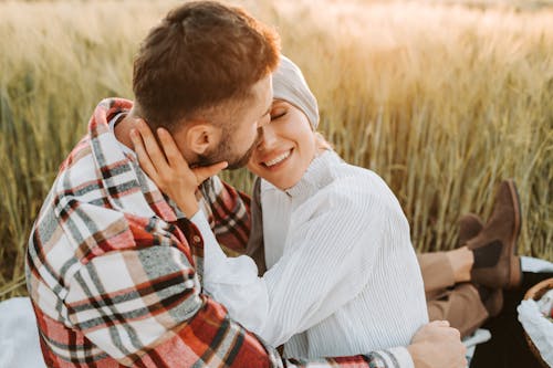 Man Kissing the Woman on Her Nose