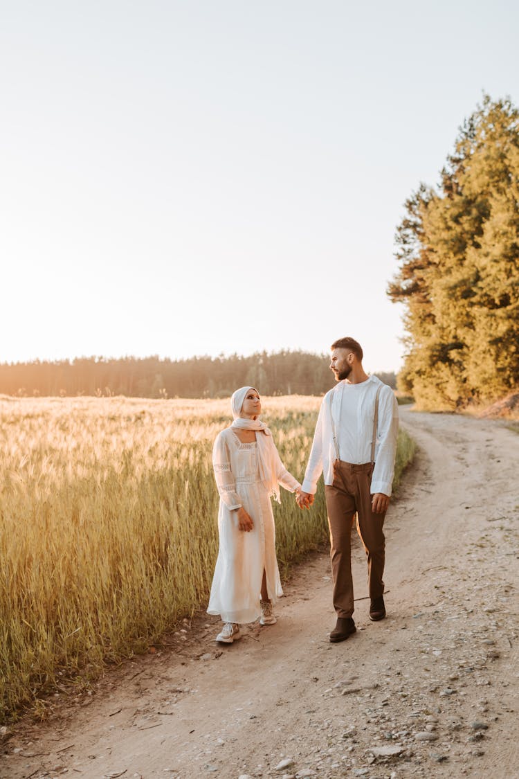 A Couple Walking In The Countryside