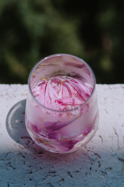 Close up of Petals in a Glass