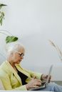 Woman in Yellow Blazer Wearing Eyeglasses