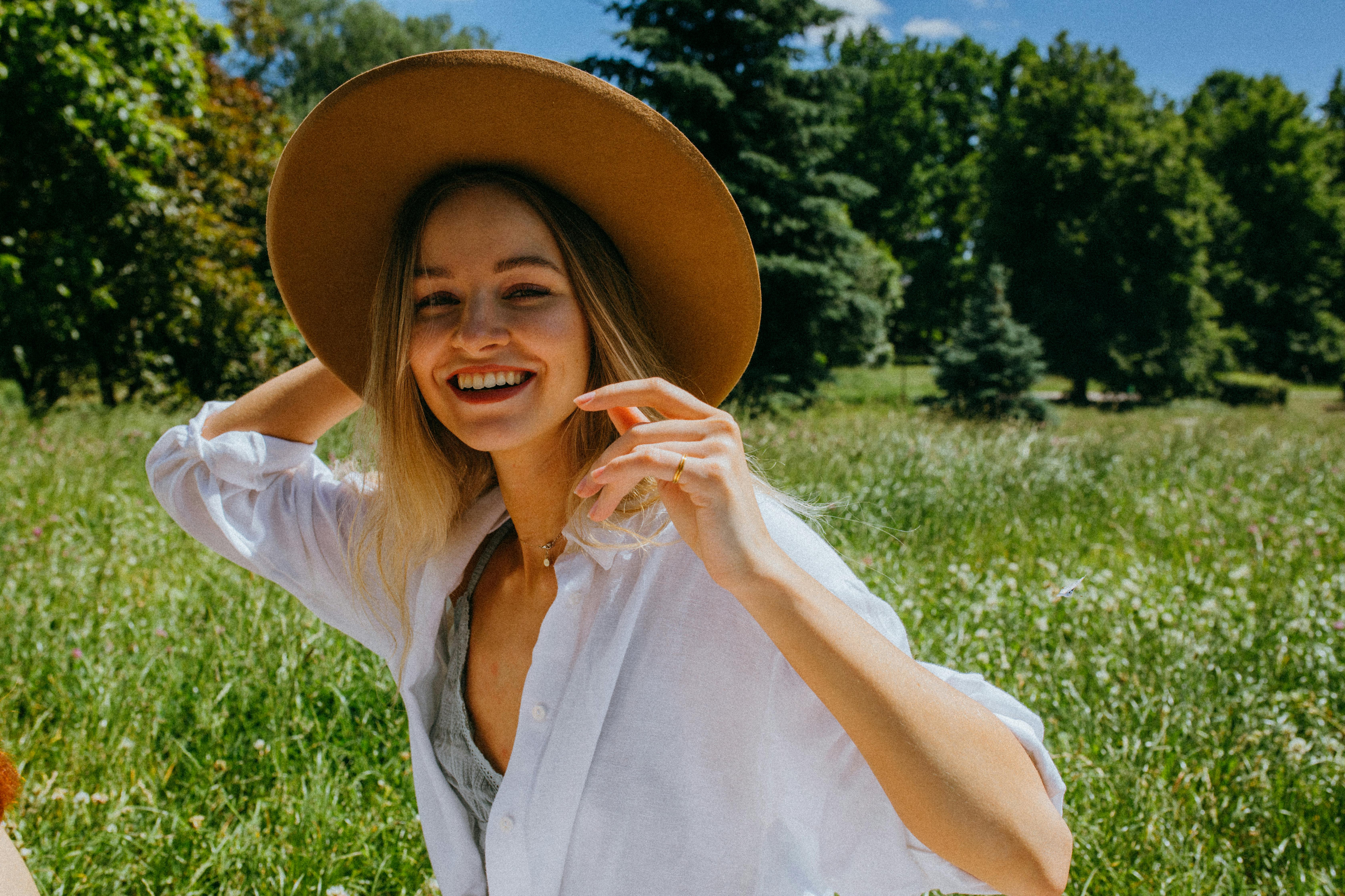a pretty woman in white long sleeves