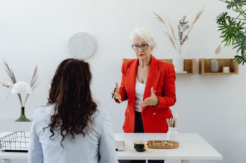 Woman Interviewing a Man · Free Stock Photo