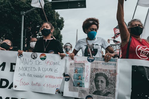 Kostenloses Stock Foto zu demonstranten, friedlicher protest, gesichtsmasken