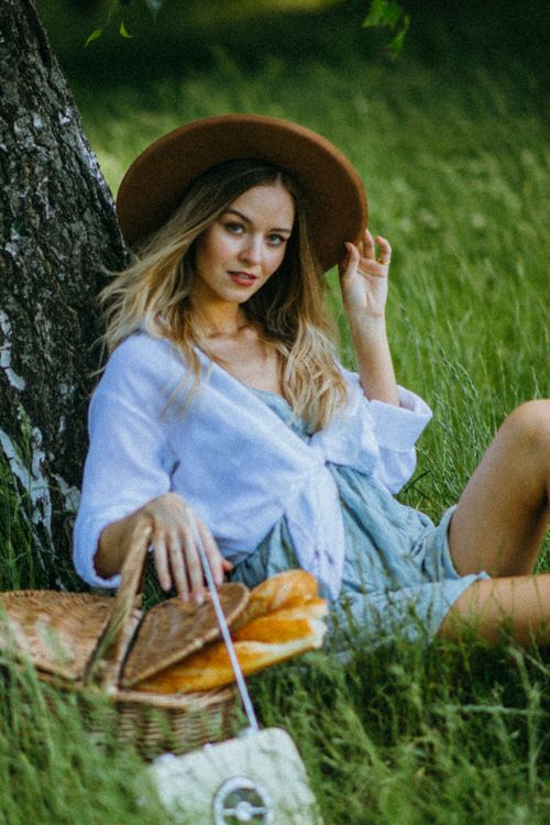 Woman in Green Dress and White Cardigan Holding Brown Picnic Basket Free Stock Photo Woman in Green Dress and White Cardigan Holding Brown Picnic Basket Free Stock Photo