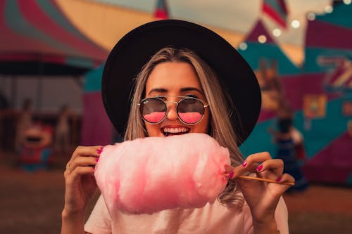 Woman Eating Cotton Candy