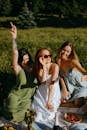 Women Having Groupie Shot in a Picnic