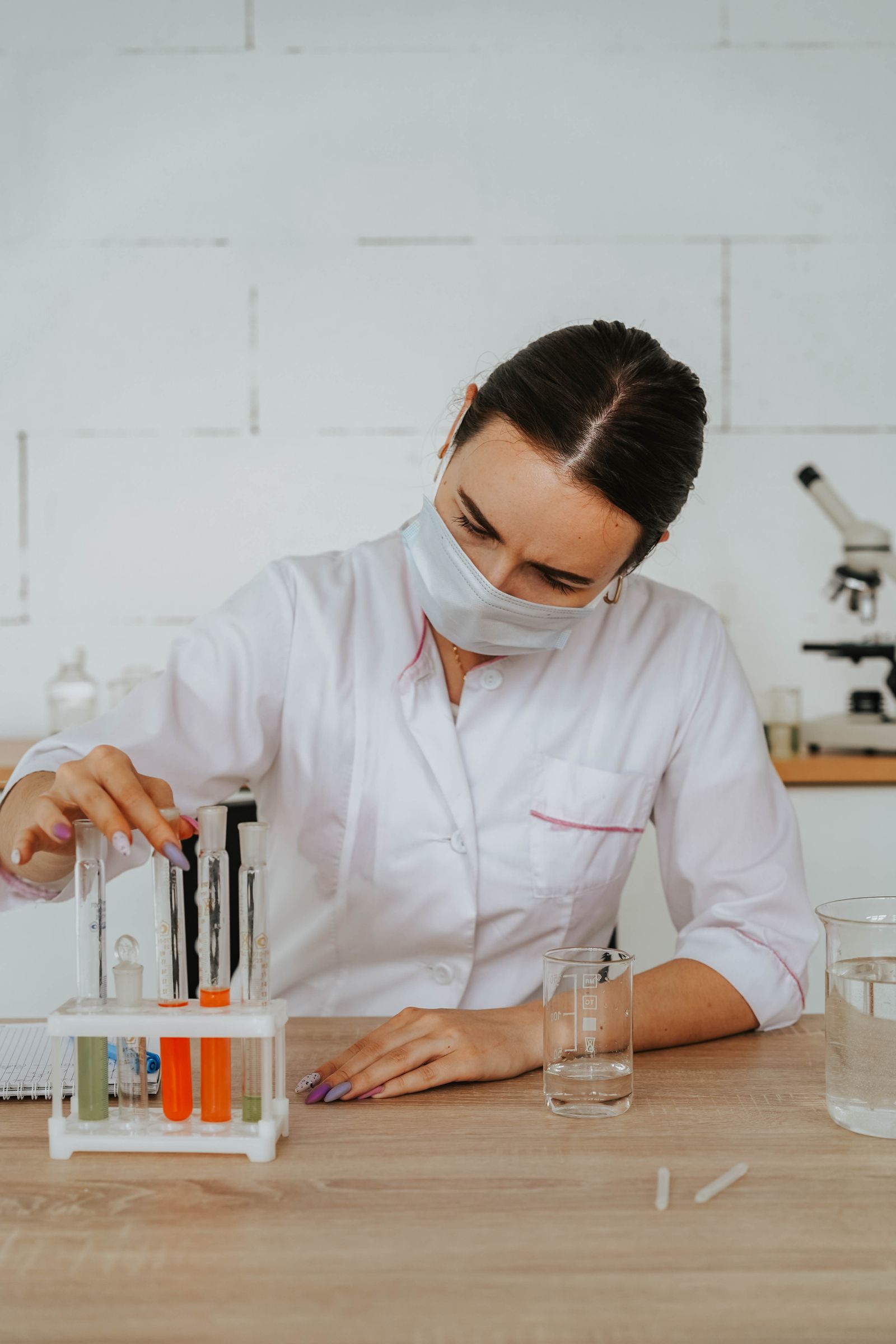 A laboratory technician preparing samples for testing
