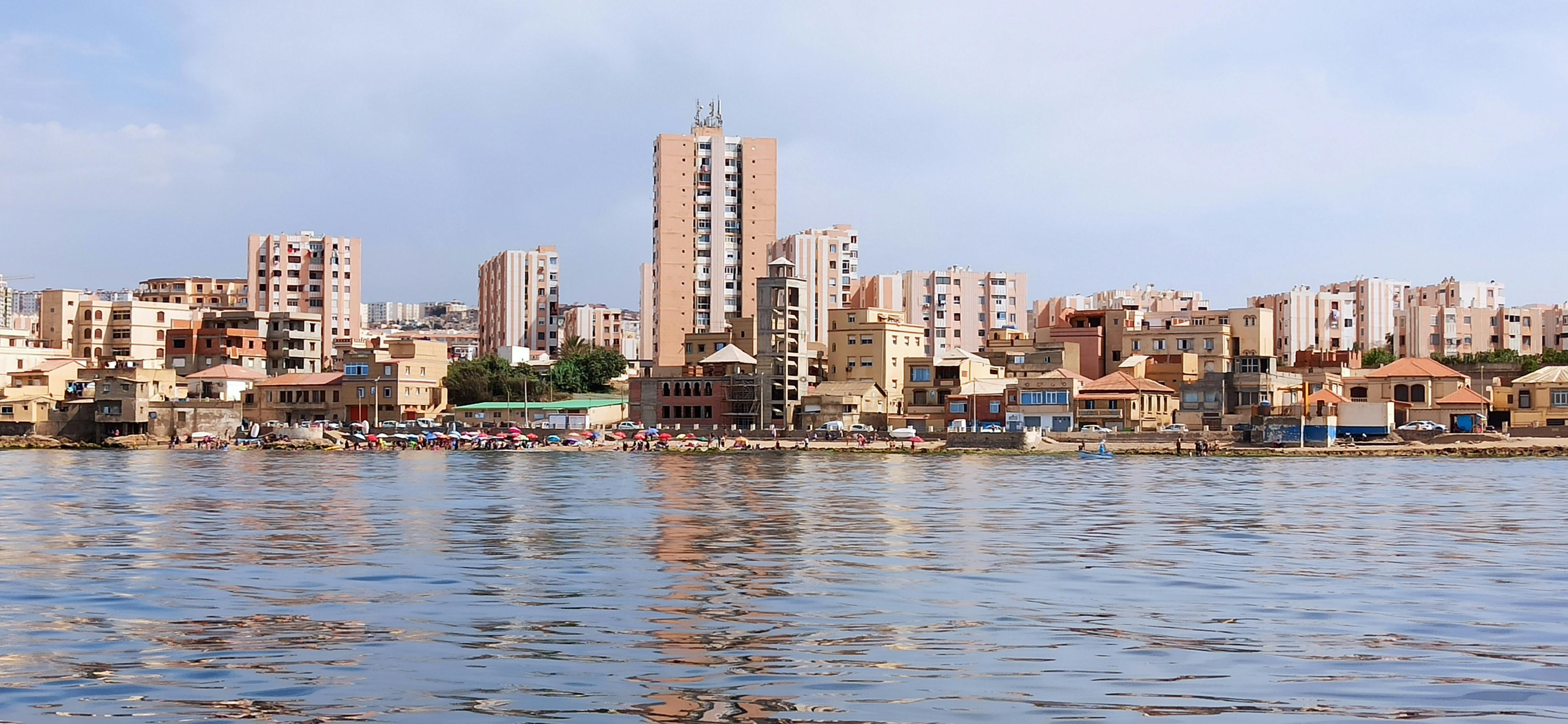Couple using a dating app together on a couch