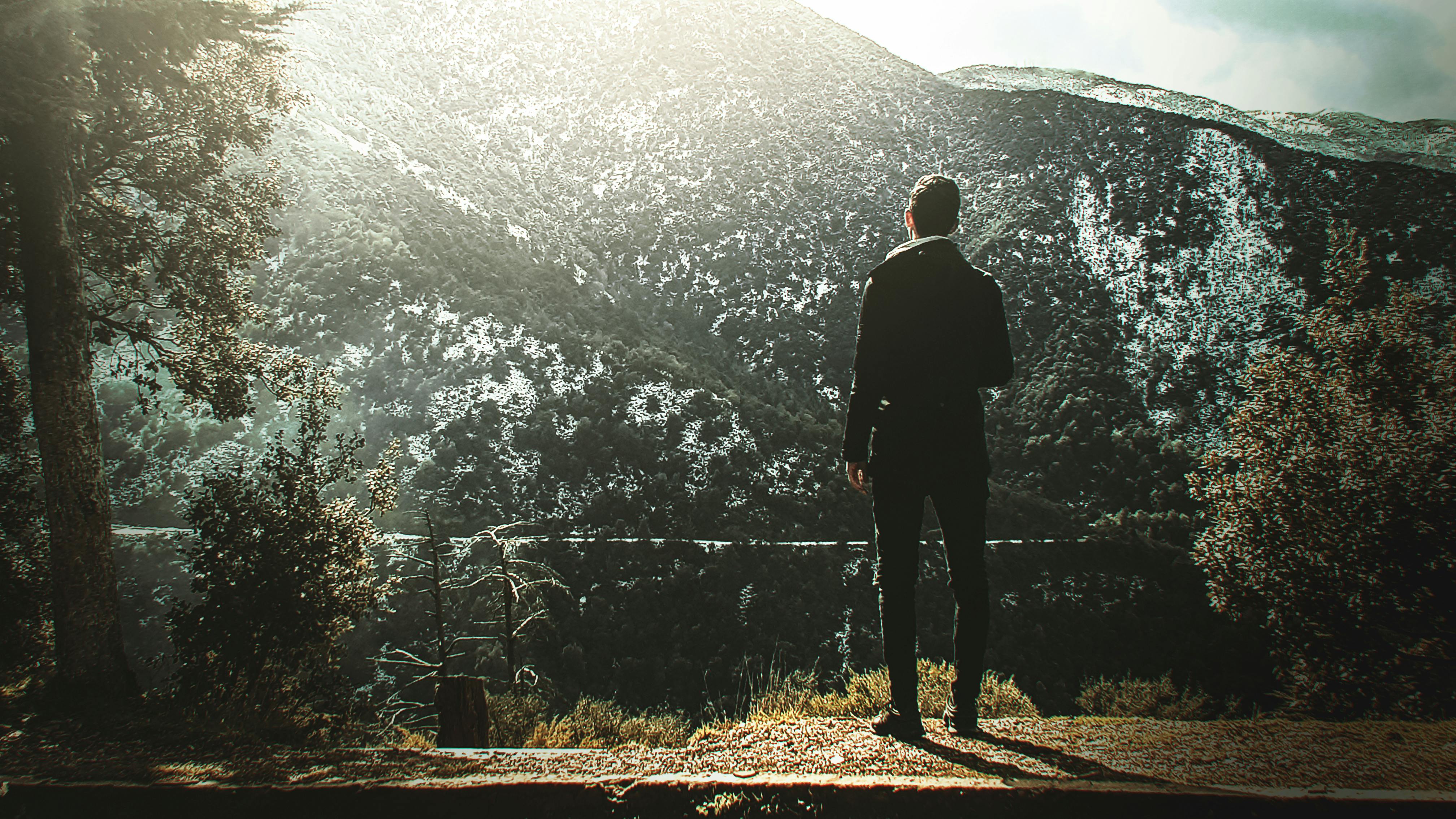 Man Standing On Cliff · Free Stock Photo