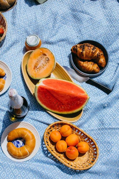 Free Mouthwatering Plates of Food on a Picnic Blanket Stock Photo