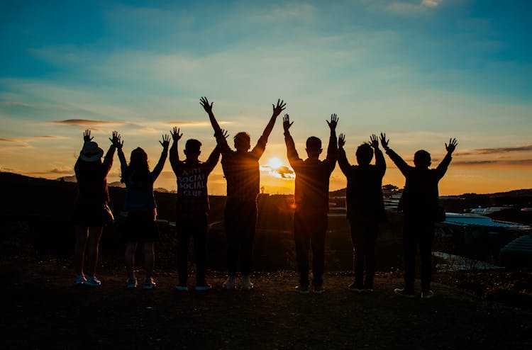 People Silhouette During Sunset