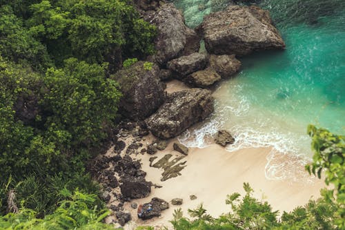 Free Aerial View of Seashore Near Large Grey Rocks Stock Photo