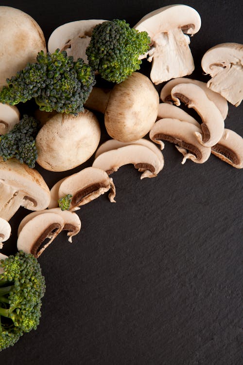 Close-Up Shot of Mushrooms and Broccoli