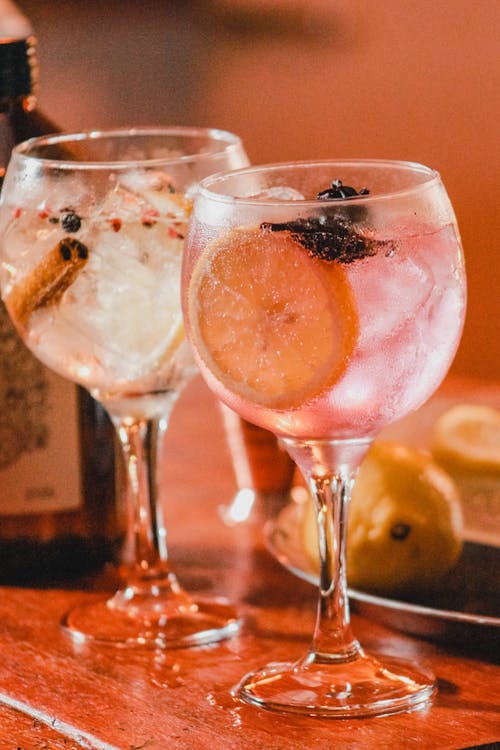 Close-Up Shot of Cocktail Drinks on Wooden Surface