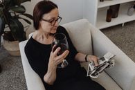 Woman in Black Tank Top Holding Wine Glass