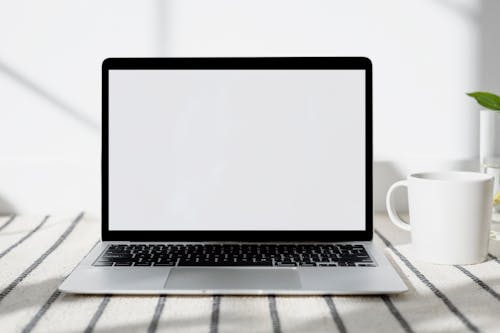 Free A Laptop With a White Screen Stock Photo