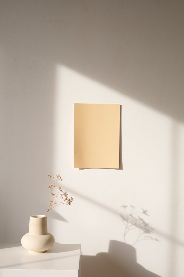 Brown Paper On White Wall