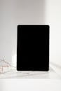 Black Ipad on White Table