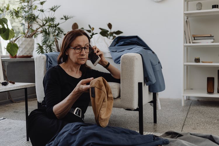 A Sad Woman Talking On The Phone