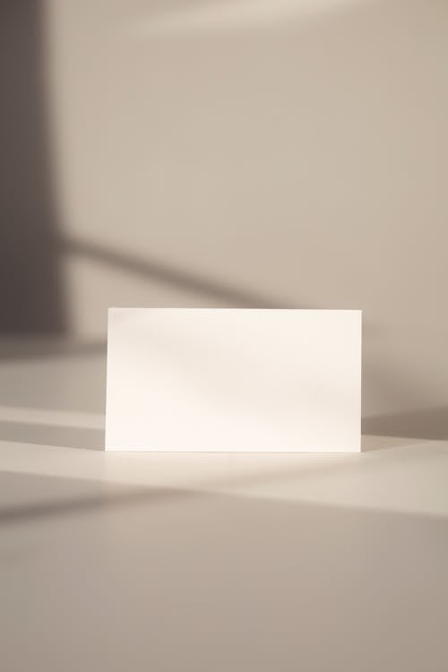 Foto d'estoc gratuïta de espai per a text, maqueta, paper blanc