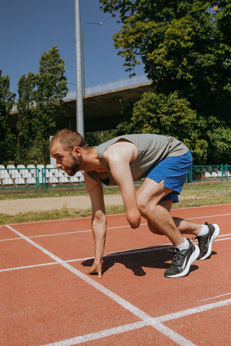 Disabled Man On A Running Sports Track 