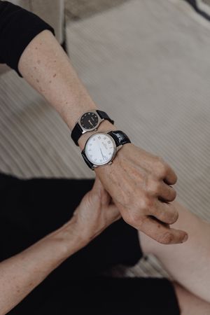 Two watches worn on one wrist — photo by kaboompics.com on Pexels