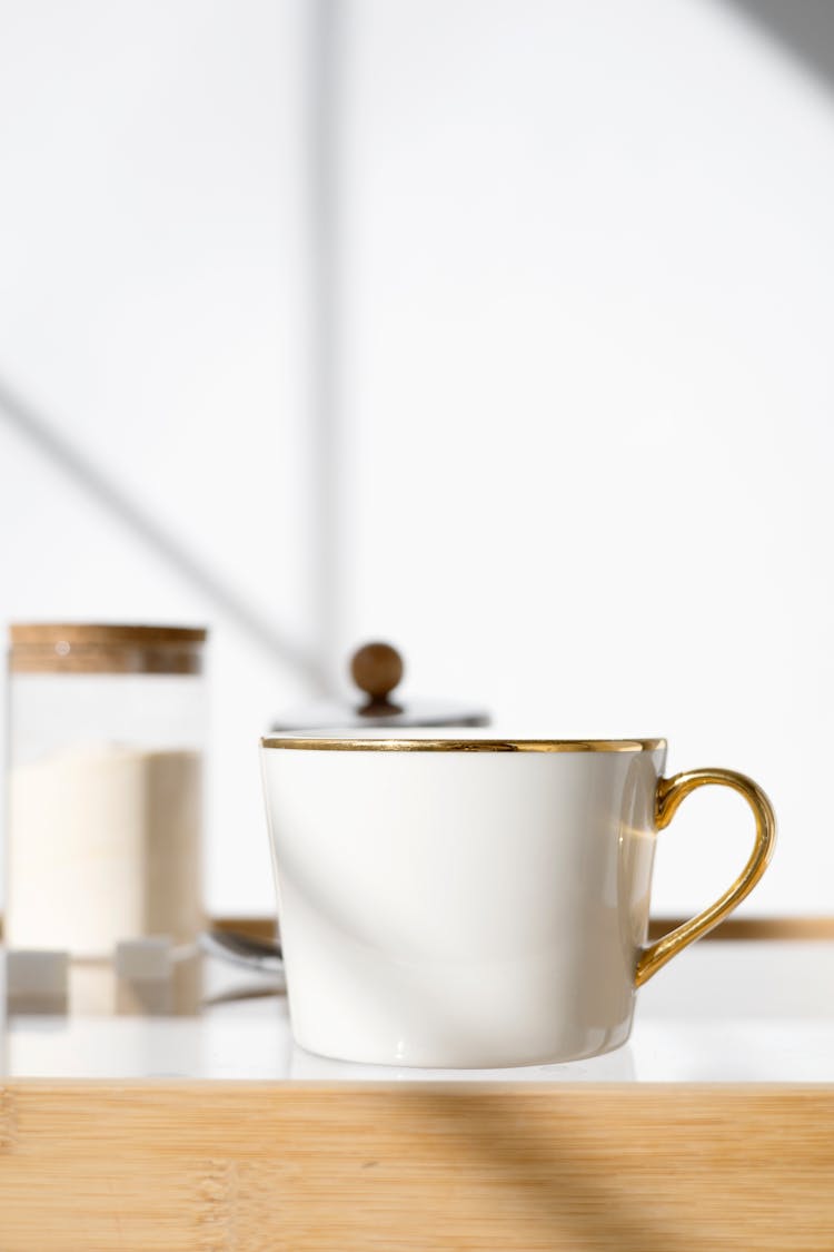 White Porcelain Cup With Gold Trims