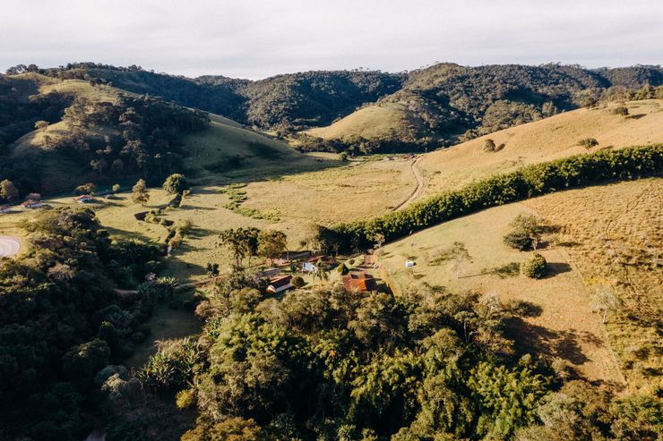Rolling hills seen from the air, photo by Matheus Bertelli on Pexels