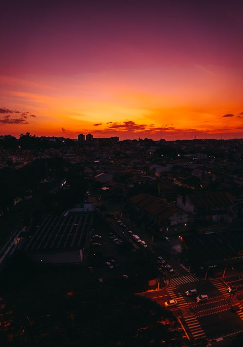 Free A breathtaking sunset view over Gleba do Pêssego, São Paulo, Brazil, showcasing vibrant urban scenery. Stock Photo