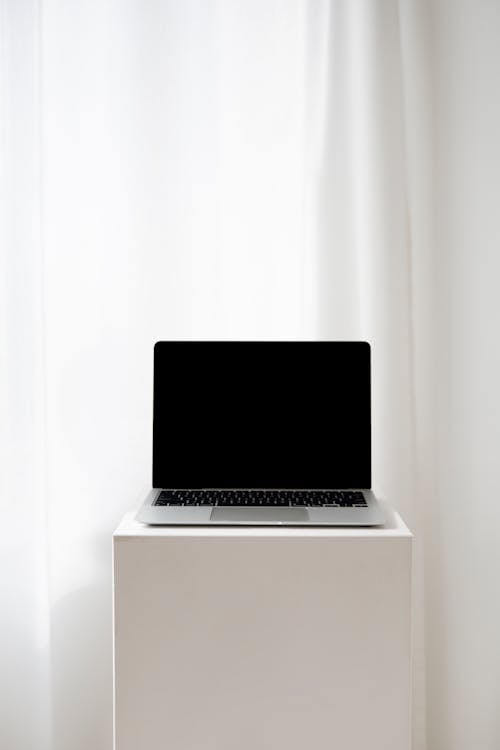 Laptop on a White Table