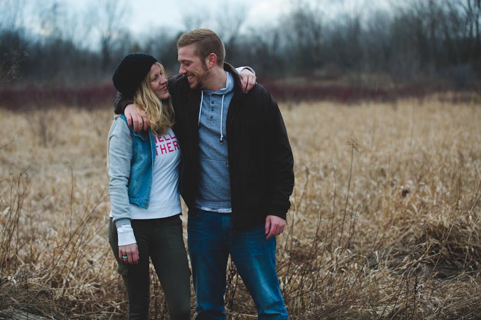 Photo of Couple Near the Field 