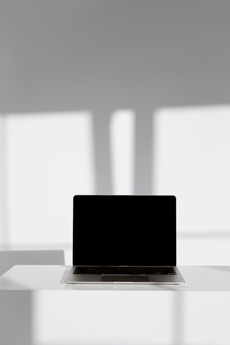 Still Life Of A Laptop With Black Screen