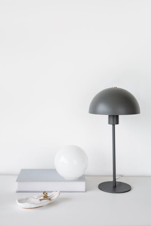 Lamp, Book and Glass Ball