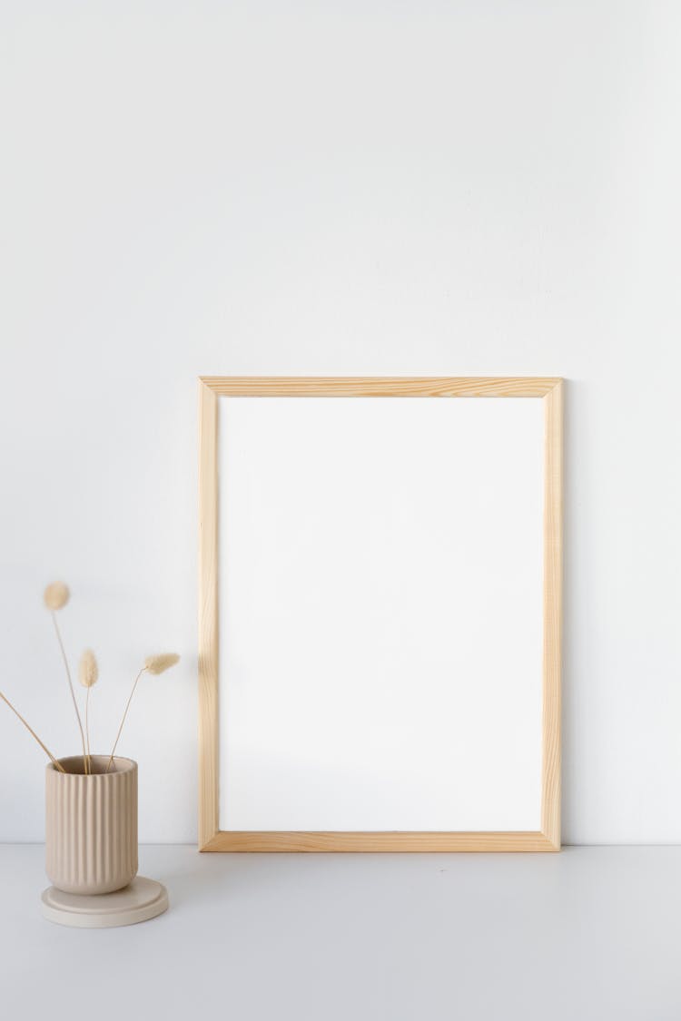 Empty Frame And Vase