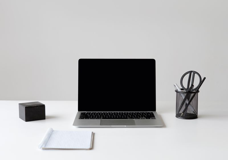 Coreline brand product on a minimal laptop workspace