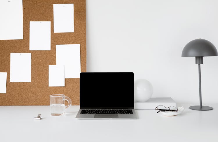 MacBook Pro On White Table