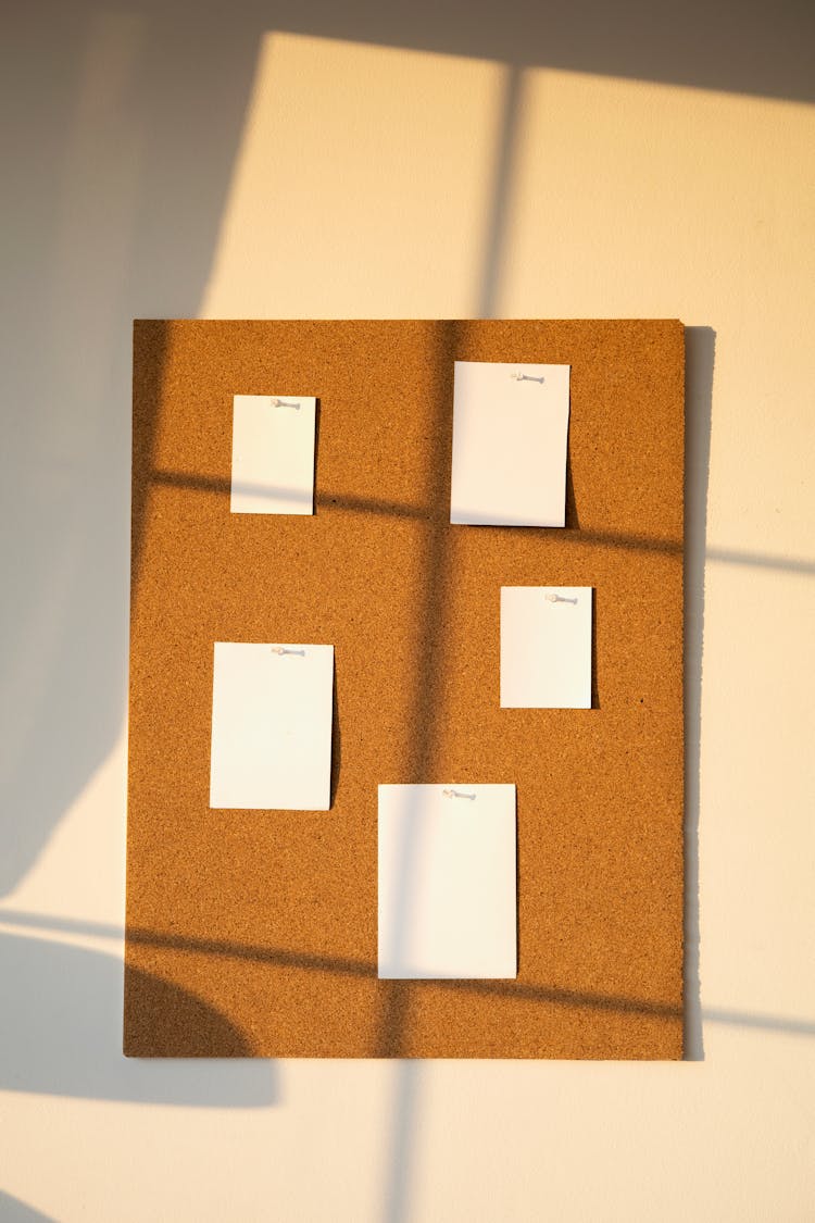 A Corkboard With Blank Notes