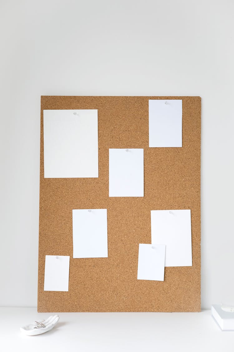 A Corkboard With Blank Notes