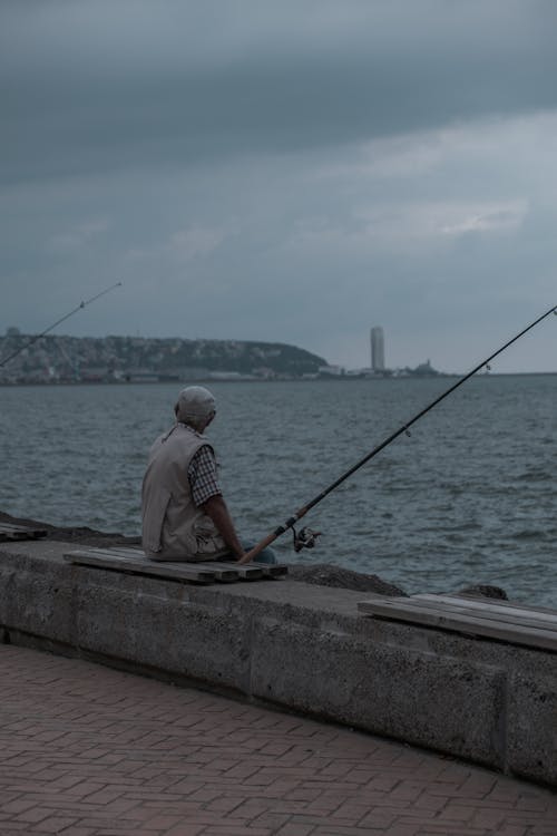 A Man doing Fishing on the Seaside