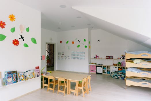 Bright and inviting kindergarten classroom interior with wooden bunk beds and playful decor.